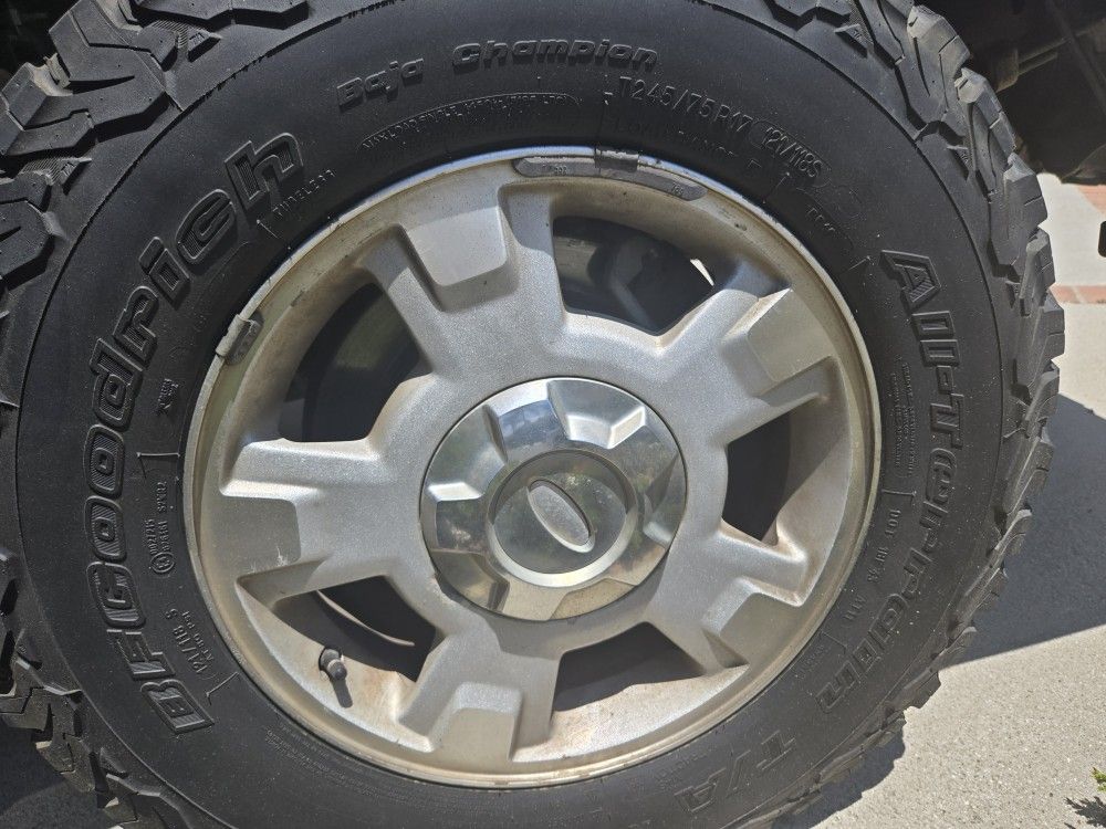 Ford F150 OEM Wheels And Goodrich AT Tires