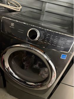 Selling a matching Electrolux LuxCare SmartBoost washer and LuxCare PredictiveDry dryer in beautiful graphite gray. Both are in working condition and 