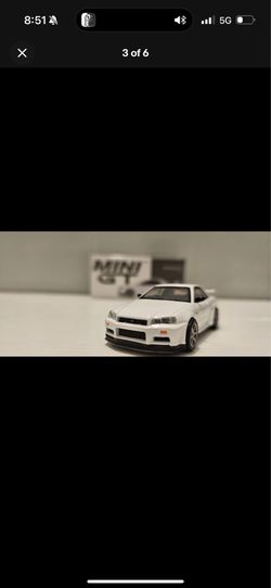 1/64 Mini GT Nissan Skyline GT-R (R34) V-Spec White 397