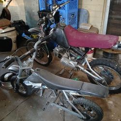 Two Dirt bikes Plus Extra Motor