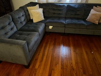 Sectional with pillows included