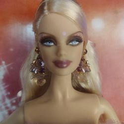 Barbie 2009 Holiday Barbie $60