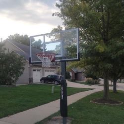 Goaliath 54 inch in ground basketball hoop, adjustable basketball court 