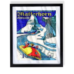 Custom art piece of the disneyland Matterhorn poster in black frame