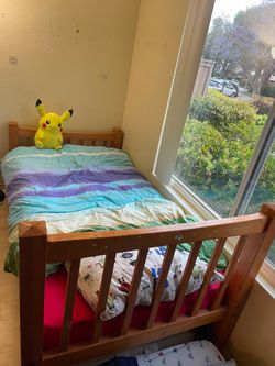 Wooden single bed