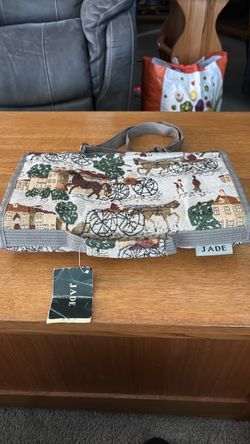 Rolling bag, Tapestry. Jade Luggage