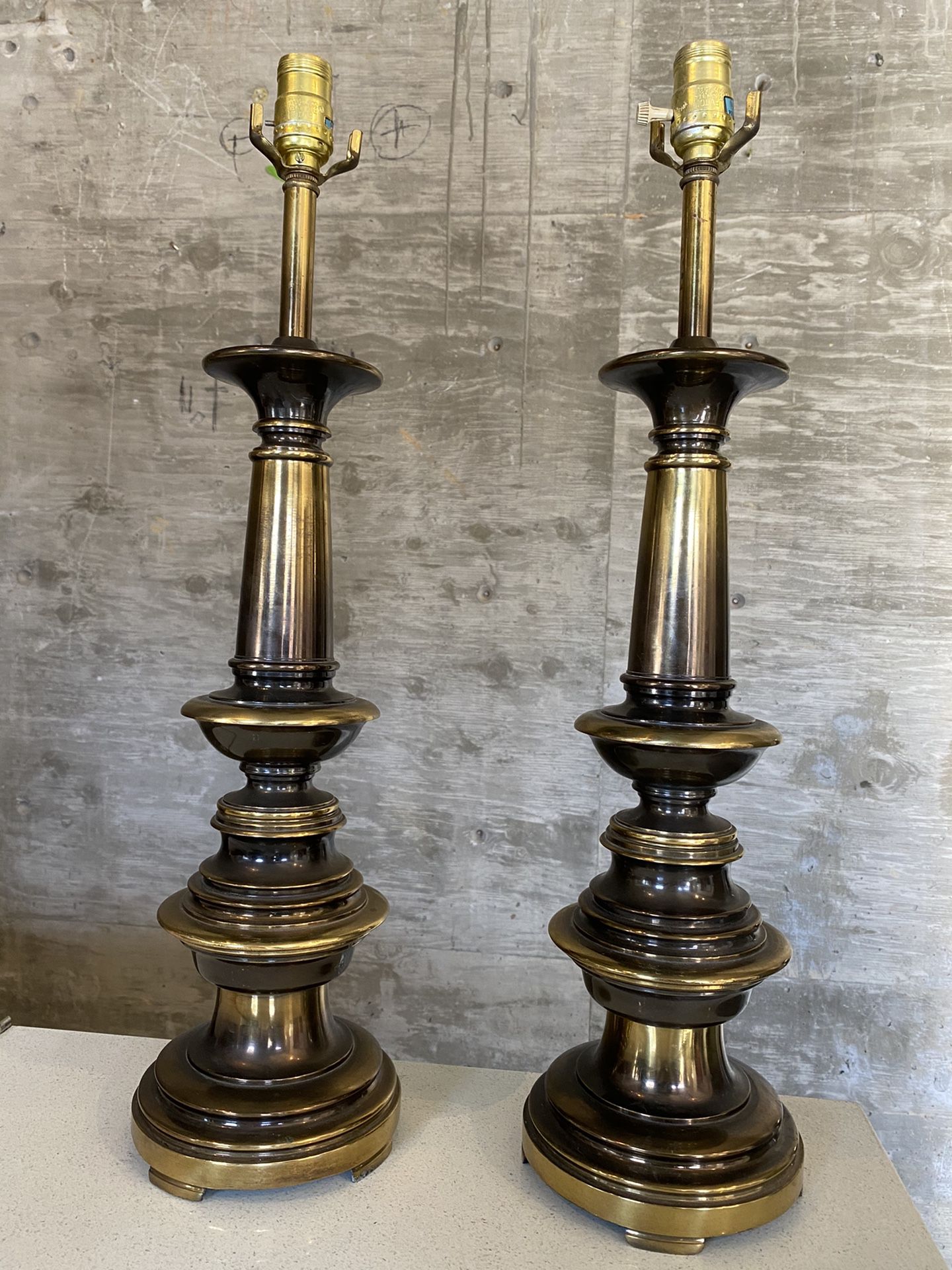 Antique solid brass heavy lamps work great