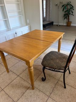 Table with one iron chair