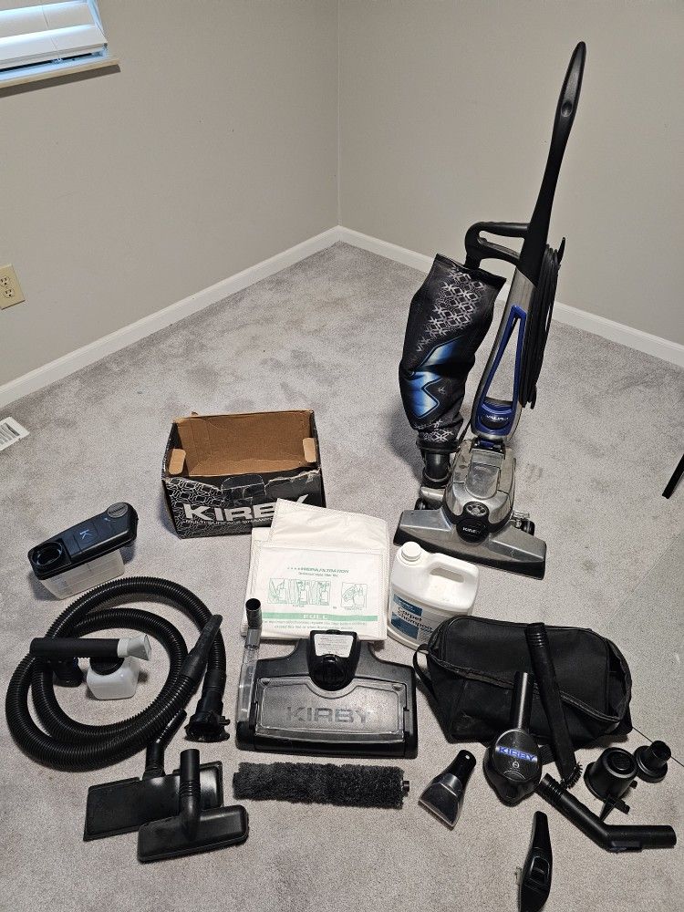 Kirby Avalir 2 With Shampoo System, accessories, turbo brush, extra bags, and kirby carpet shampoo