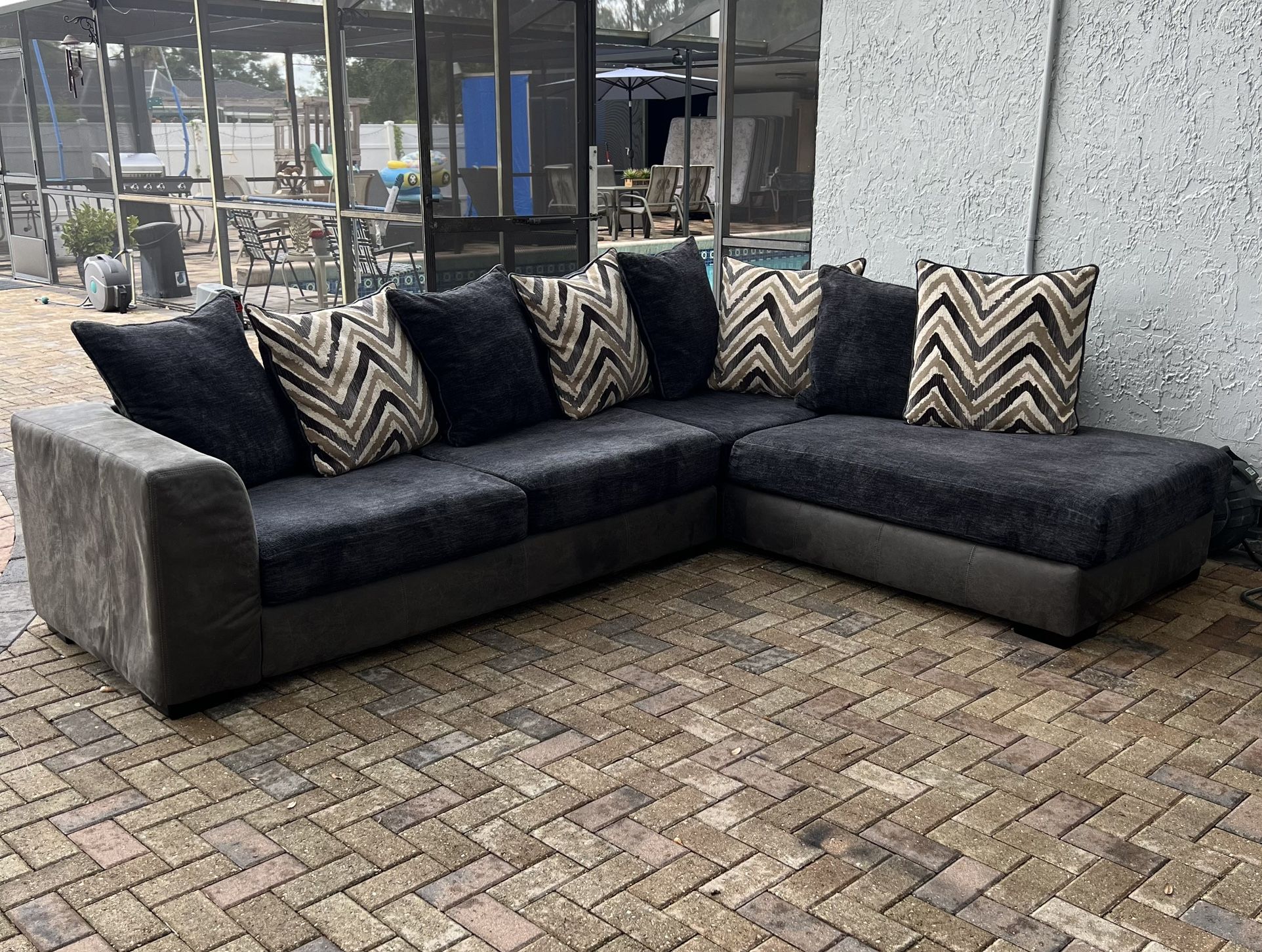 Novelia 2-Piece Sectional: 119"W x 91"D x 38"H. I can deliver for an additional cost. Upholstered in soft woven fabric
