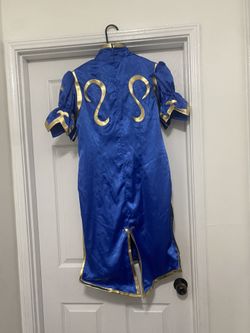 Pretty royal blue dress with gold trim can be worn as a costume small medium for either teenage or adult
