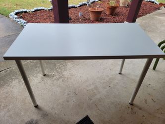 4 ft x 2 ft Ikea desk table in very good shape,  sturdy