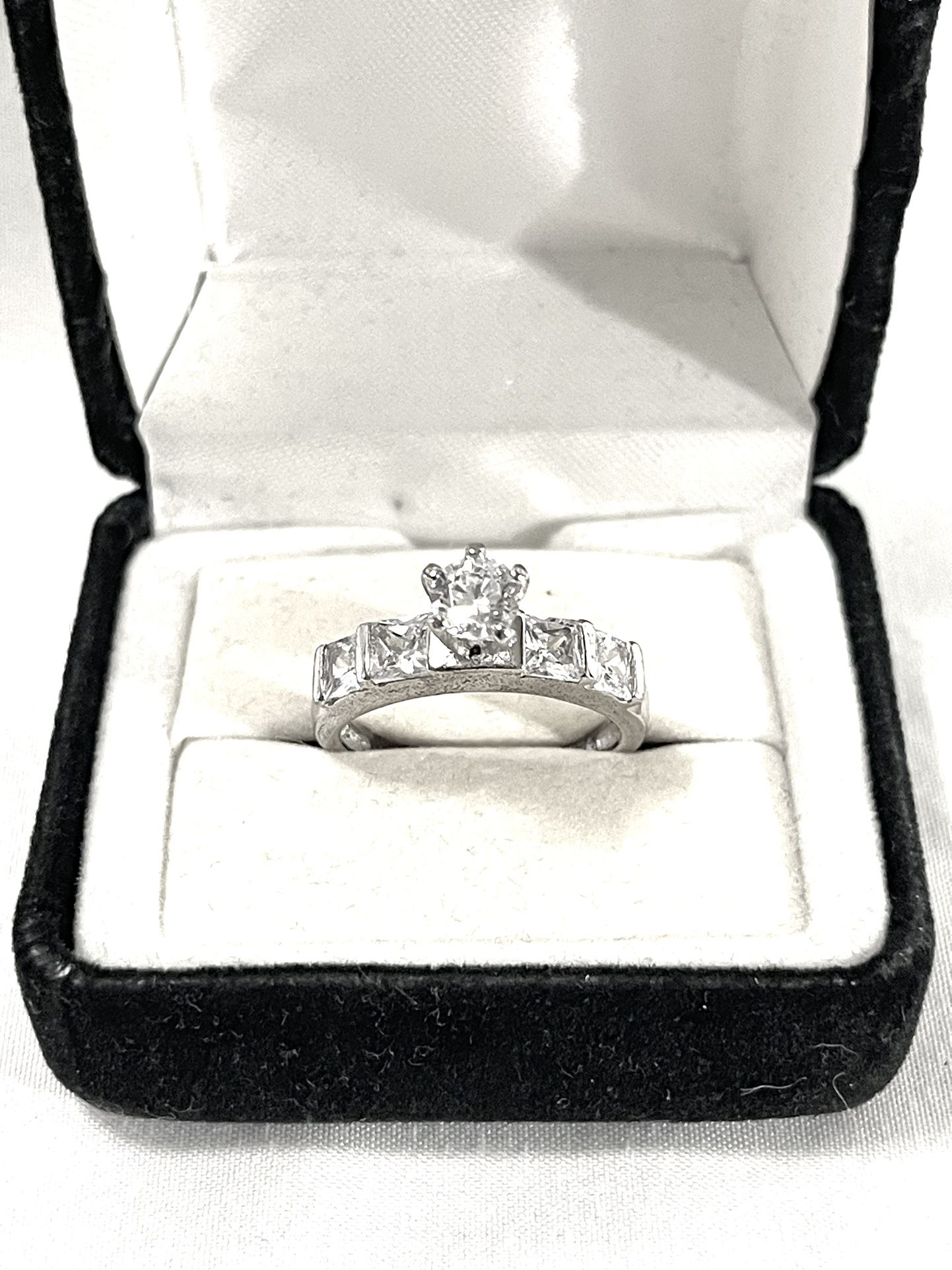 Brand New Cubic Zirconia C Diamonds Set In A Sterling Silver Wedding Ring. Size 7.5