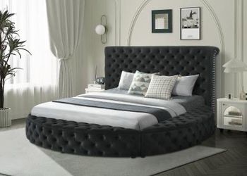 Brand new black velvet king size round bed with storage.  Mattress sold separately