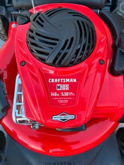 Craftsman push lawnmower starts right up runs perfect truly like new.