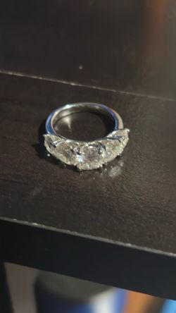 Moissanite five stone engagement ring