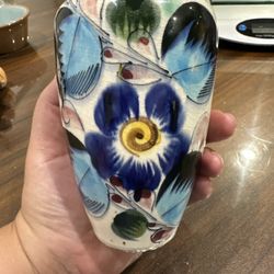 Hand-painted ceramic vase with floral motifs in Tonala style.