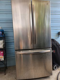 Kenmore stainless steel refrigerator with ice maker