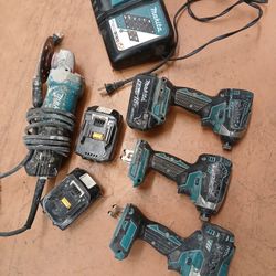 Makita hemadrill two impact drills in a makita angle grinder