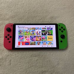 NINTENDO SWITCH OLED with 100 SWITCH GAMES and 7000 CLASSIC GAMES