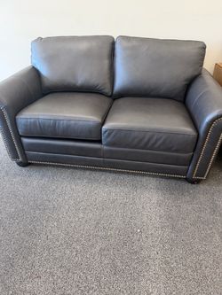 Gray Leather Loveseat with Nailhead Trim