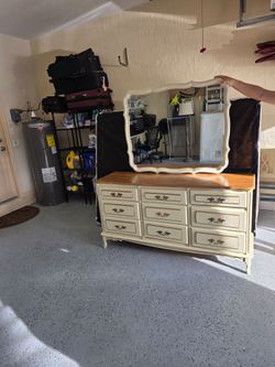 Chest of drawers and mirror