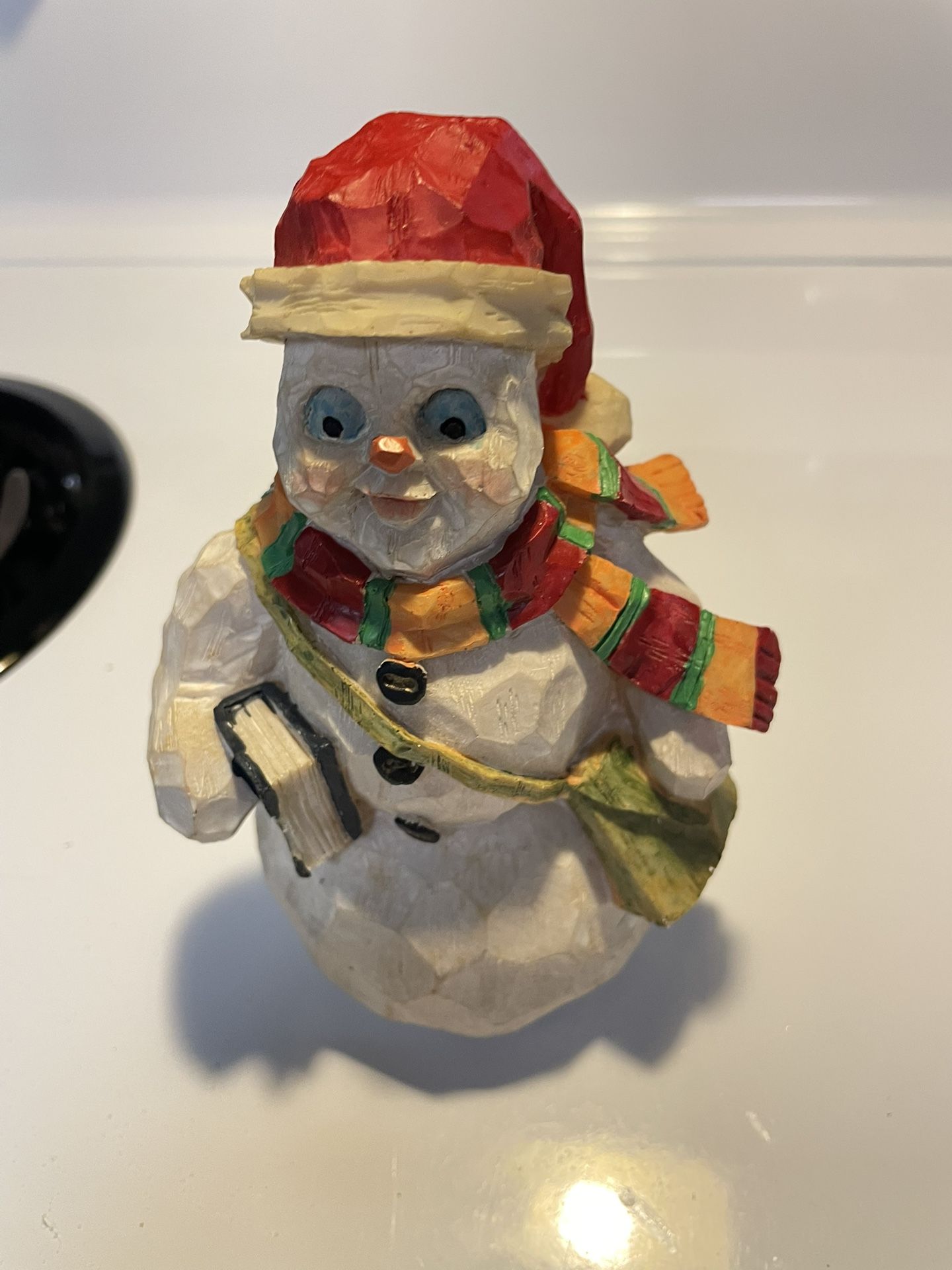 Vintage Resin Snowman Vintage Resin Textured Off-White Snowman Figurine. Red Hat, Green, yellow Scarf. Lightweight resin. 7.5” tall.