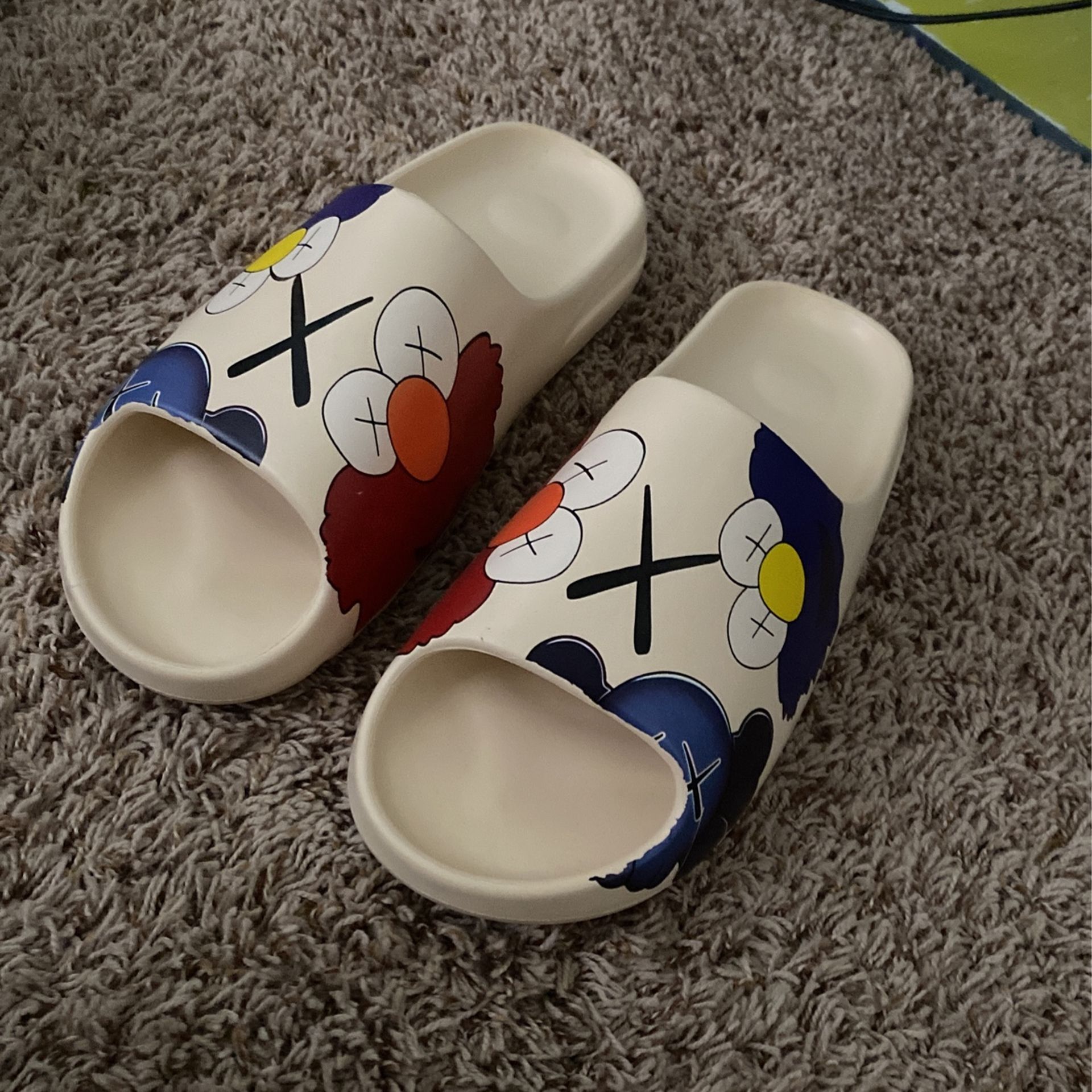 Kaws Slides