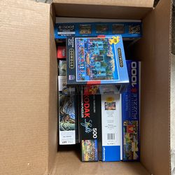 Box Full Of Like New Puzzles