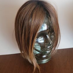 Belle Tress Wig Light  Brown Synthetic Fiber Made in Indonesia. Perfect 
shape, like new, please see the photos.
Weight 13oz with shipping materials