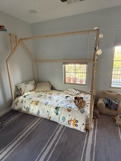 Children’s wooden “house” bed