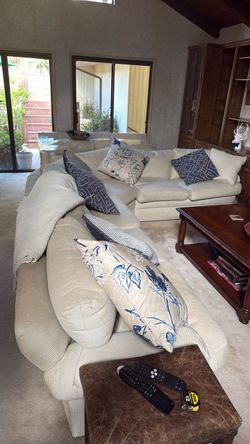 Rounded cream colored couch - Ellen Baum decorator