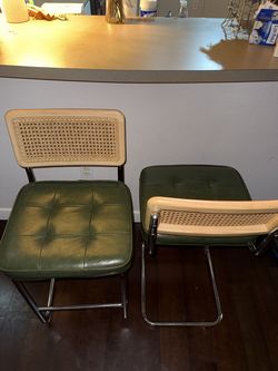 Green cushioned cane-back stools — pair