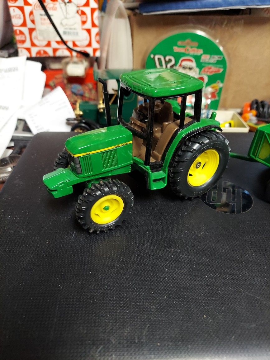 John Deere Tractor Set, Cast Iron Tractor Cast Iron Grain Wagon, Pull Behind Disc, Sold As3 Pieces,  Like New Condition  Made By Ertl