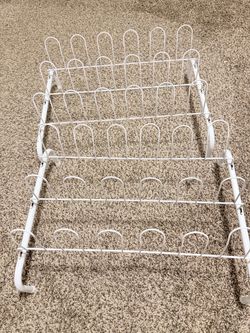 2 White shoe racks