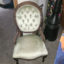 Victorian ladies parlor chair, green buttoned velvet cover, c. 1875 vintage accent on wooden Casters