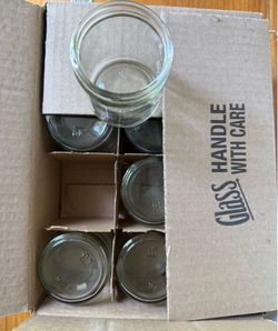 Boxes of 12 glass jars (no lids)