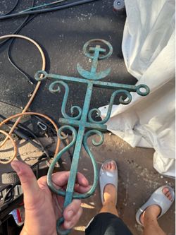 60 plus years old Handmade antique triple cross cast iron?