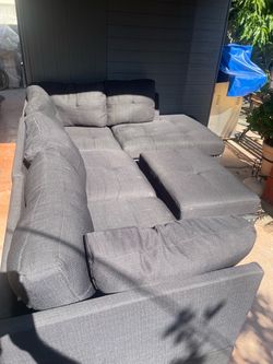 Black Sectional Couch with Ottoman