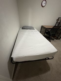 Twin bed plus mattress