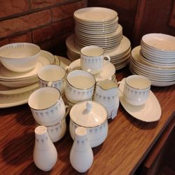China 
Mikasa Aurora 160 includes 66 pieces: plates, bowls, cup /saucers & serving pieces.