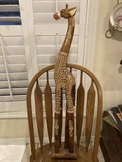 Wooden giraffe statue
