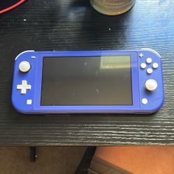 Nintendo Switch Lite with charger