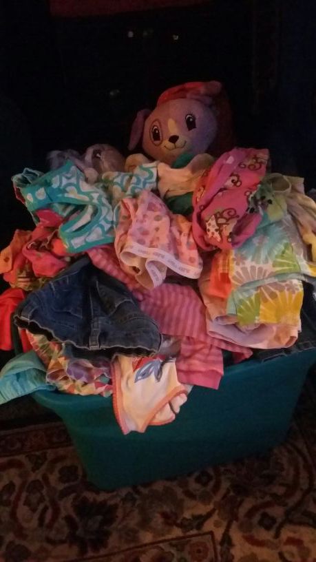 Tote full of infant clothes