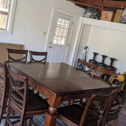 Selling this solid wood dining table with 8 chairs