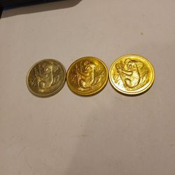 One Silver And Two Gold Colored Advertising Tokens For Las Vegas NCM