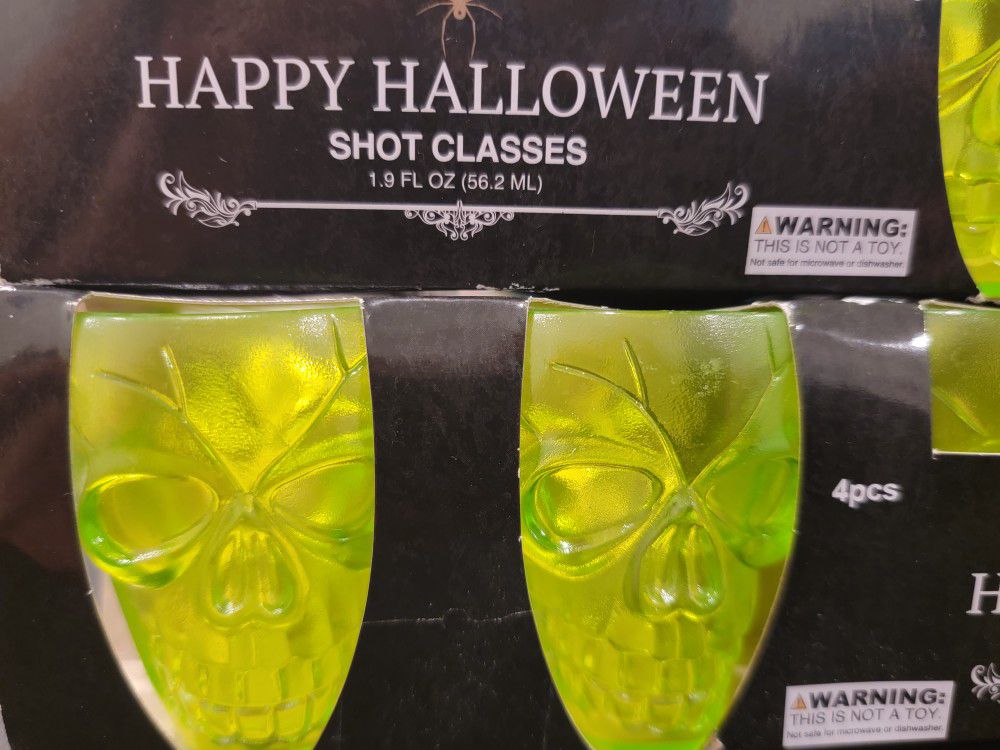8 Plastic Reusable Green Skull Shot Glasses