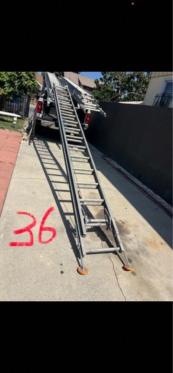 Excellent condition, 36 feet and more sizes available aluminum extension, Ladders