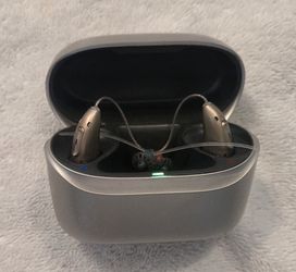 Phonak I90 w/charging case.   Works.