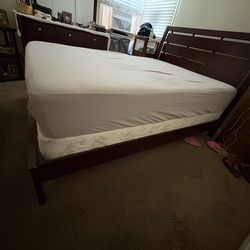 Wood bed frame and firm mattress from IKEA